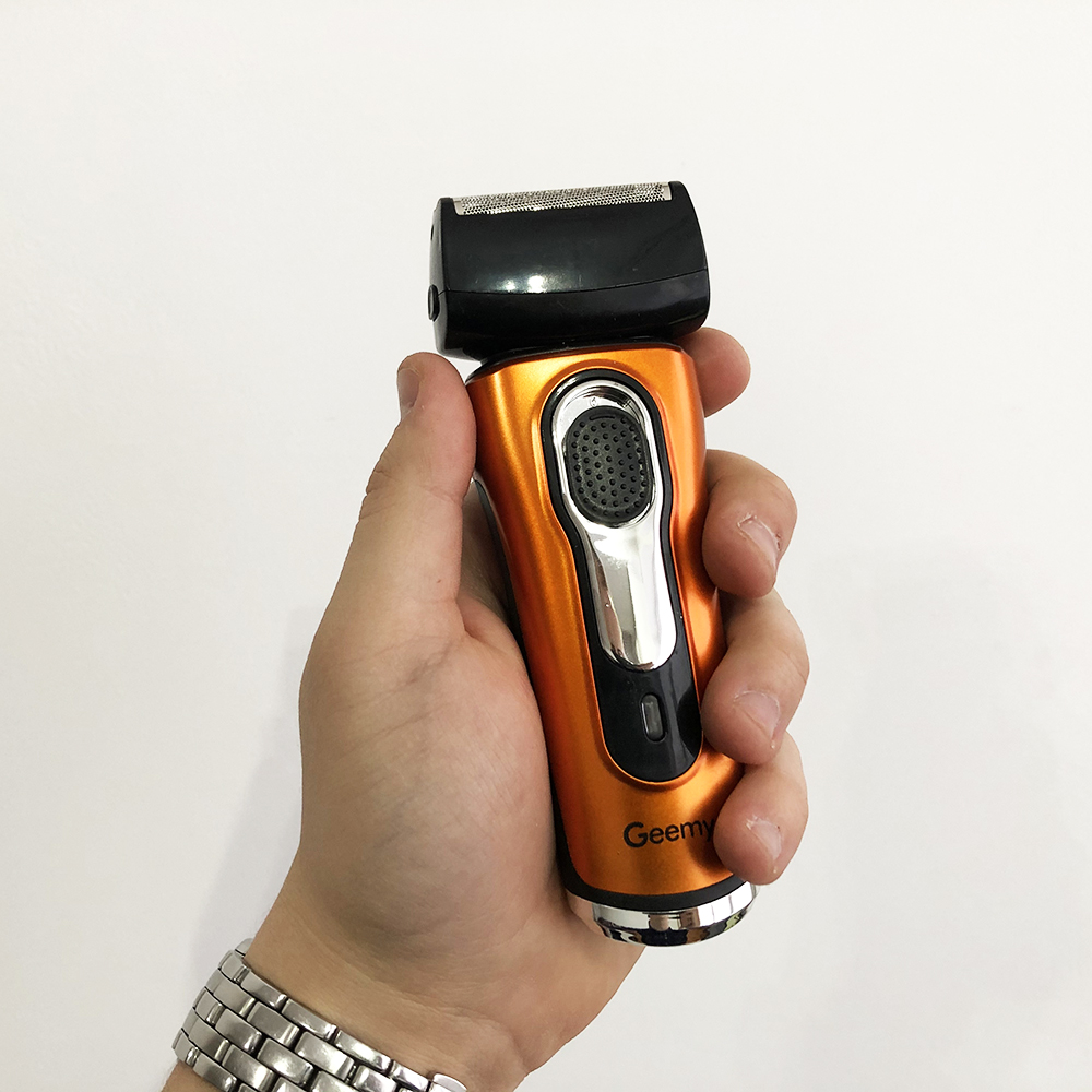Электробритва бритва GEMEI GM-7110. Цвет: оранжевый